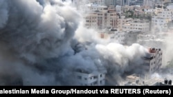 Dim posle eksplozije u gradu Gaza, 18. oktobra 2023.