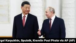 Очільники Китаю та Росії Сі Цзіньпін (ліворуч) і Володимир Путін. Москва, 21 березня 2023 року