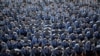 Pjesëtarët e rinj të Policisë së Kosovës marrin pjesë në ceremoninë e diplomimit të gjeneratës së 58-të të Policisë së Kosovës, në Prishtinë, më 14 korrik 2023.