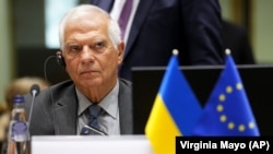 ЄС «глибоко шокований» масовими похованнями, виявленими в Ізюмі