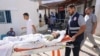 Një fëmijë i plagosur nga sulmet raketore në Gaza.