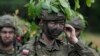 O femeie soldat la instrucție în Polonia, pe 20 iunie 2024. 