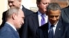 Predsjednici Rusije Vladimir Putin (L) i SAD Barak Obama (D) prilikom zajedničkog poziranja lidera G20 na samitu u Sankt Petersburgu