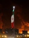 FILE PHOTO: Fire rages at Tehran's Shahran oil depot in Iran after Israeli attack