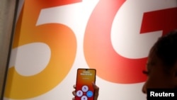 Marea Britanie a acordat marți Huawei un rol limitat în dezvoltarea rețelei 5G din Marea Britanie