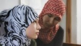 Edem Smailovıñ qadını Lilâ Kelâmova ve küçük qızı Esma