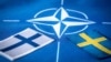 Flamujt e Finlandës, Suedisë dhe NATO-s. Fotografi nga arkivi. 