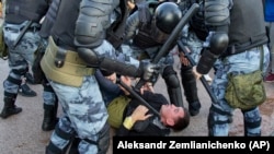 На акции протеста в Москве 27 июля 2019 г.