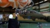 Iran Vows To Boost Military, Parades New Jet To Deter U.S. 'Attack'