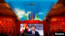 Portreti i Xi Jinping në një muze ushtarak në Pekin. 