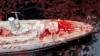 Акція під посольством Франції у Києві: модель військового корабля в басейні крові, 15 травня 2014 року