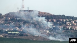 Tym mbi qytetin Metulla në veri të Izraelit, si pasojë e raketave të hedhura nga territori i Libanit, 26 qershor 2024.