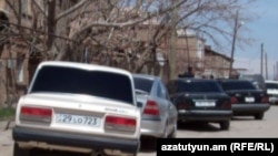 Armenia -- Cars parked outside the Armavir house of Meruzhan Mkhoyan, an election candidate allegedly beaten up by loyalists of his pro-government rival, 6Apr2012.
