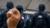BOSNIA - HERZEGOVINA -- Bosnian Serb police secure an area at the spot with the symbol of a raised hand and a picture of the late David Dragicevic on it, in Bosnian town of Banja Luka, northwest of Sarajevo, Bosnia, Tuesday, Dec. 25, 2018