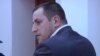 Armenia - Mihran Keshishian, police officer, allegedly assaulted by opposition activist Samson Khachatrian, attends his trial, 19Apr2011.