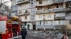 Urmările unui atac rusesc cu drone asupra unei clădiri de locuințe din Kiev.