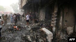  محل انفجار در منطقه الکراده بغداد