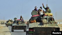 Ливийские повстанцы. Теперь и Россия признала созданный ими Национальный переходный совет легитимным.