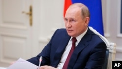 Predsednik Rusije Vladimir Putin na Investicionom forumu u Moskvi putem video linka, 30. novembra 2021. 