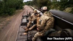 Ushtarët ukrainas mbi një tanke. 14 shtator 2022.
