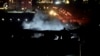 Fotografi e nxjerrë nga një video e Rudaw TV që shfaq tymin duke dal nga një ndërtesë e goditur në Irbil të Irakut më 16 janar 2024. 