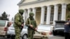 UKRAINE – Armed Russian military without identification (so-called "green men") at the airport in Simferopol, February 28, 2014