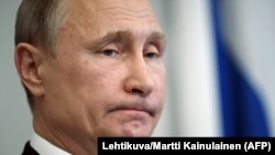 Russian President Vladimir Putin speaks to reporters in Savonlinna, Finland, on July 27.