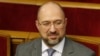 UKRAINE -- Denys Shmyhal, who was nominated as the candidate for the post of Ukrainian Prime Minister, applauds during a parliamentary session in Kyiv, March 4, 2020