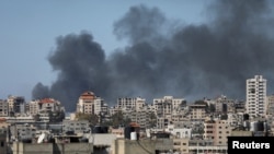 Tym i zi duke dalë nga spitali Al-Shifa dhe zona përreth, gjatë një operacioni izraelit. Qyteti i Gazës, 20 mars 2024. 