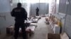 Armenia - A screenshot of official video of security officers finding large stockpiles of food in a villa belonging to retired General Manvel Grigorian, 17 June 2018.